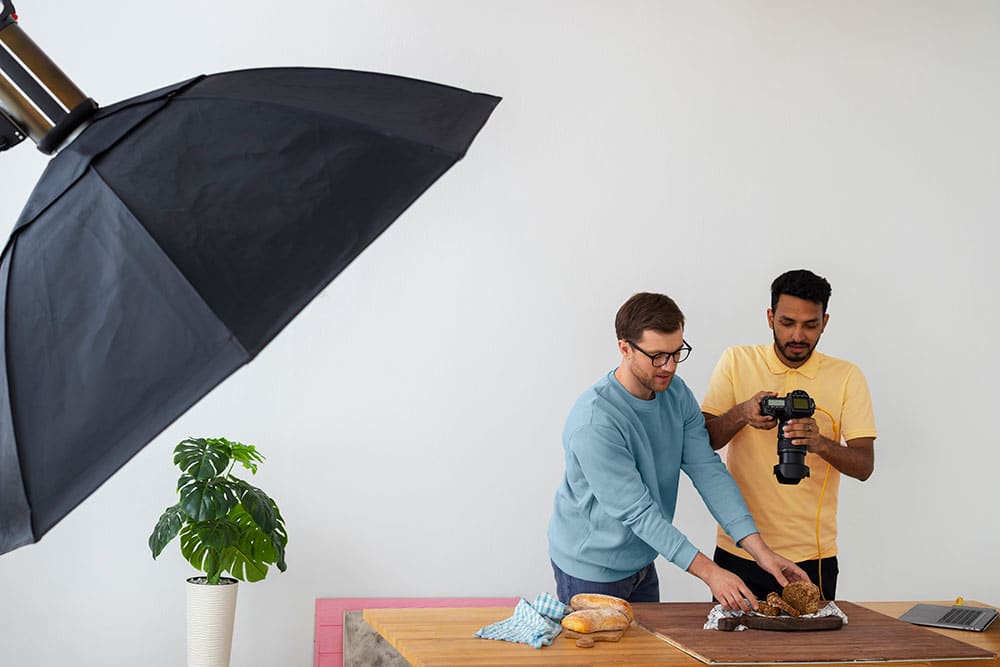 Photographers working in a professional studio environment — Melrish Studio